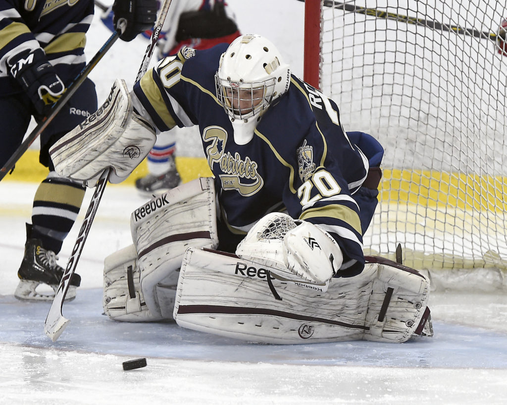 TORONTO, ON - Sep 6, 2014 : Ontario Junior Hockey League game action between Oakville and Toronto Lakeshore, Mathew Robson #20 of the Toronto Lakeshore Patriots Hockey Club makes the save during the second period. (Photo by Andy Corneau / OJHL Images)