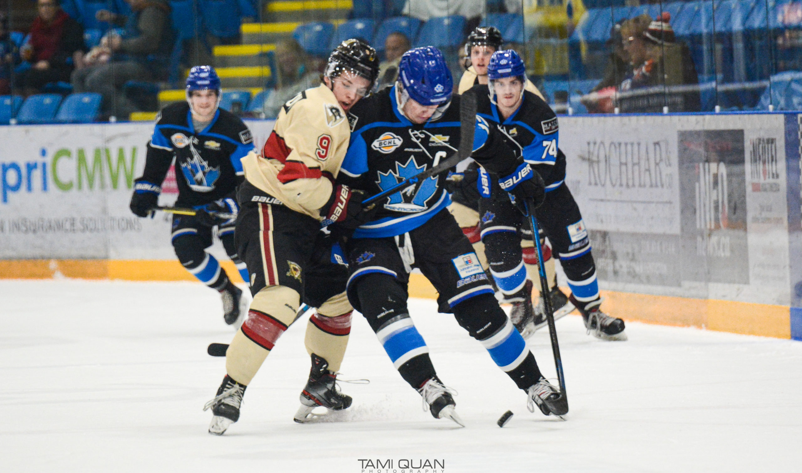 Captain David Silye try's to fend off a West Kelowna Warriors player in an effort to keep possession of the puck.